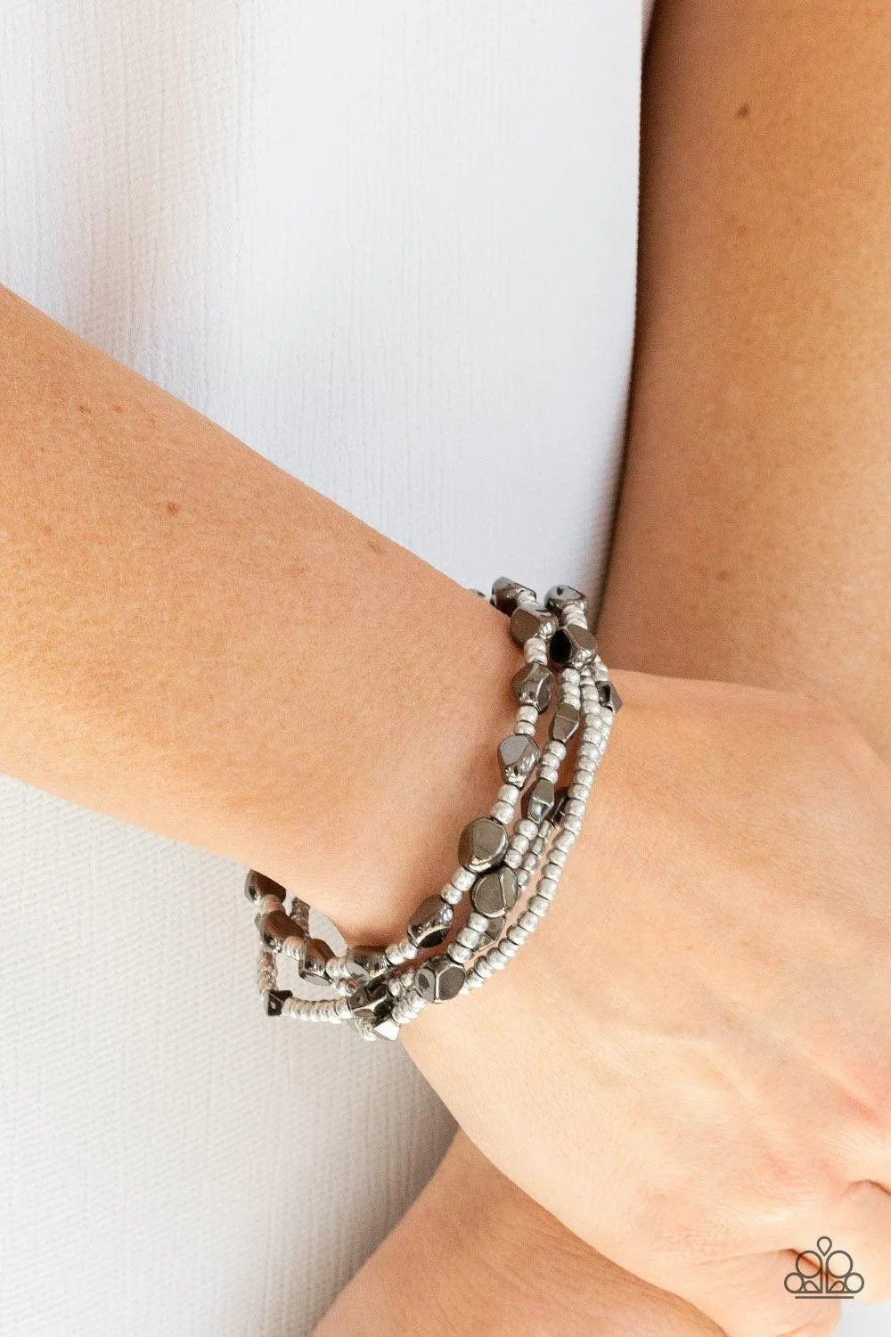 Fashionably Faceted Multi Silver and Gunmetal Bracelet Set - Paparazzi Accessories